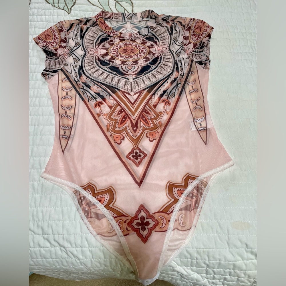 Light multicolored nylon top.